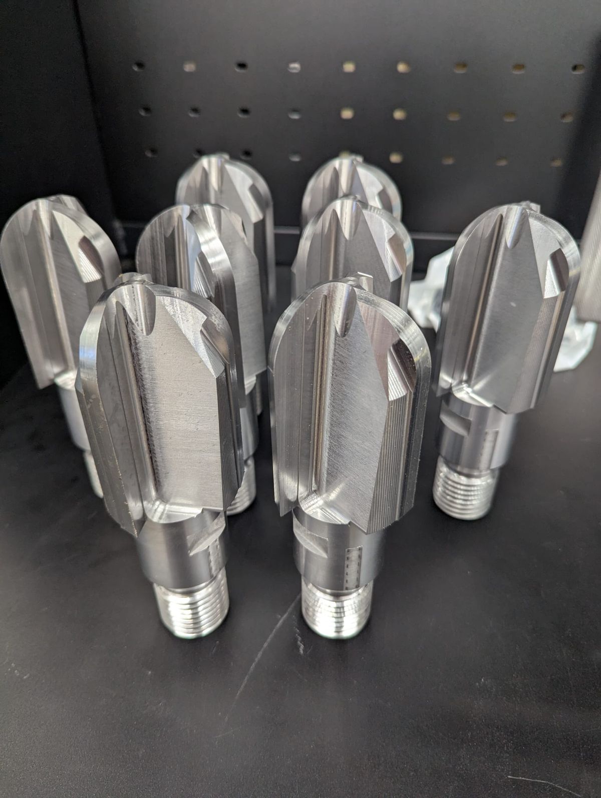 Fluted turned parts standing on end